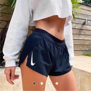 NWOT- Nike AeroSwift Women’s running shorts (Size M)